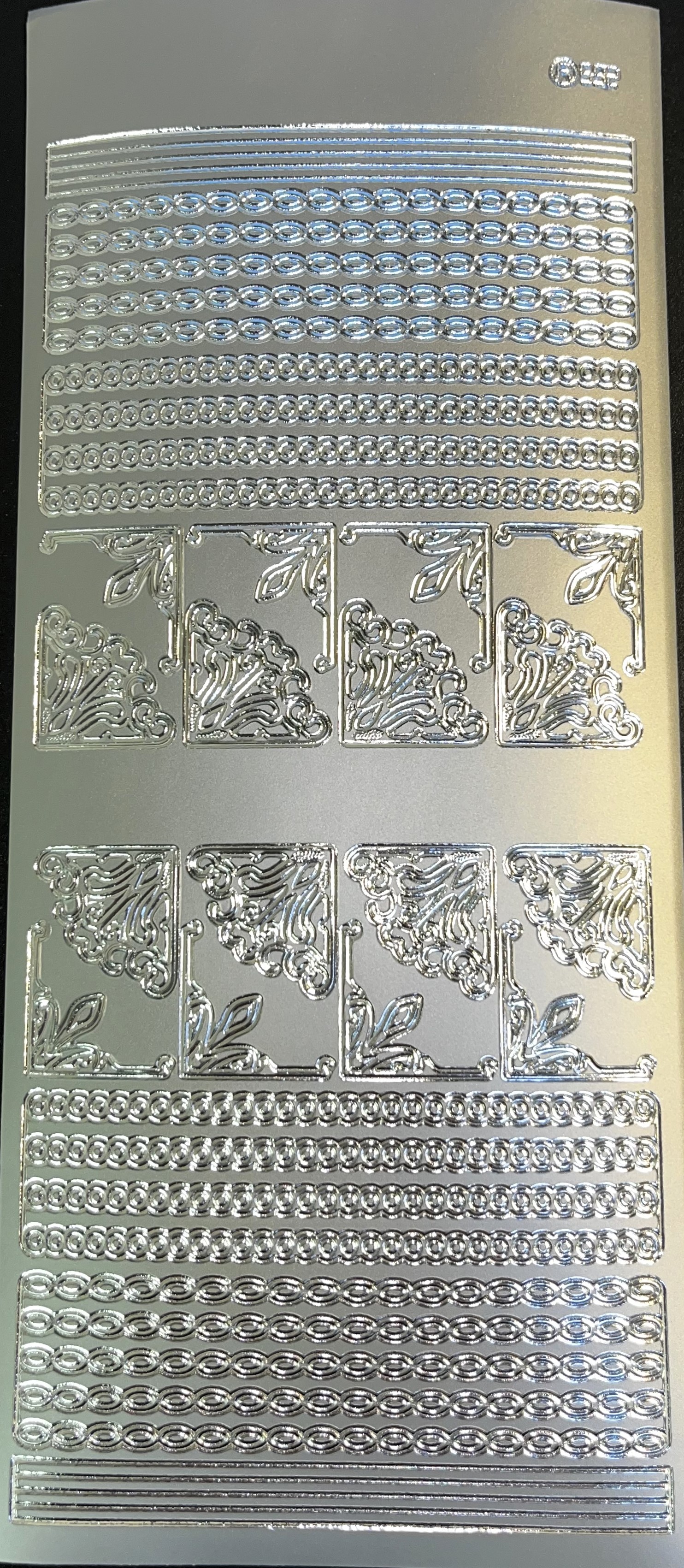 Obrysové samolepky 5ks, 10x23 cm  - rohy+linky, stříbrné